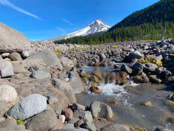 Rocks on shore against sky