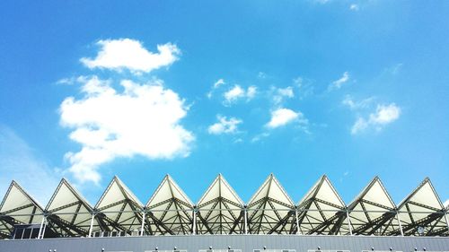 Low angle view of built structure against blue sky