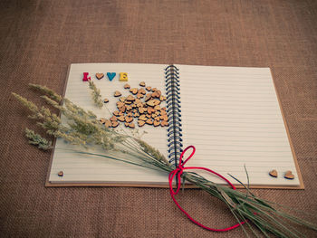 High angle view of open book on table