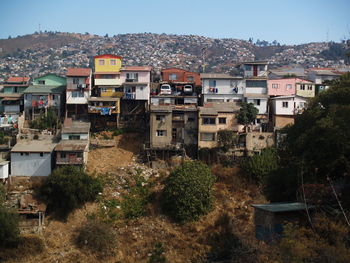 Scenic view of residential district against sky