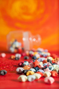 Close-up of multi colored candies on table