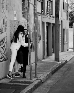 Young woman standing in city