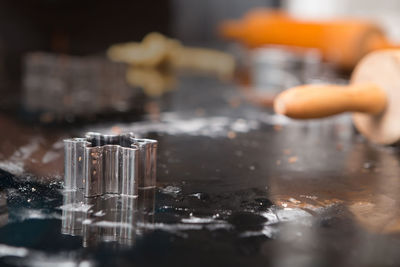 Close-up of hand on table