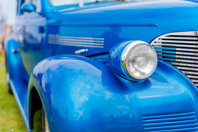 Close-up of blue car