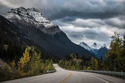 Driving the icefields parkway between jasper and banff with dramatic sky