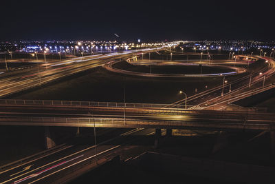High angle view of illuminated bridge at night