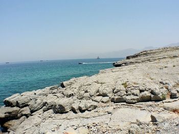 Scenic view of sea against clear sky