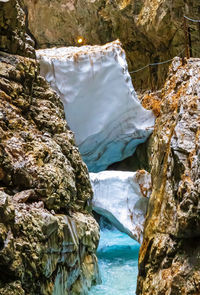 Scenic view of rocks in sea during winter