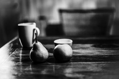 Close-up of coffee cup on table