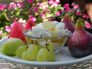 Close-up of fruits in bowl on table