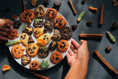 High angle view of person preparing food on table