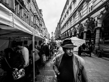 People standing on street in city