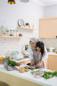 Woman preparing food at home