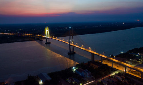 High angle view of suspension bridge at night