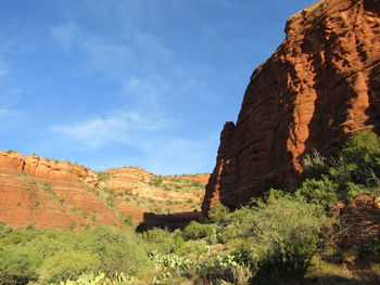 Rock formations on mountain against sky