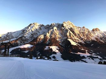 Snow covered mountain against sky