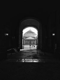 Empty corridor of building at night