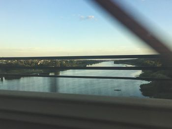 Bridge over river against sky