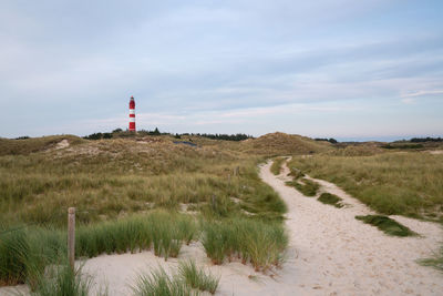 Panoramic image of the wittduen lighthouse at sunset, amrum, germany