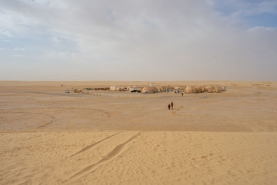 Scenic view of desert against sky