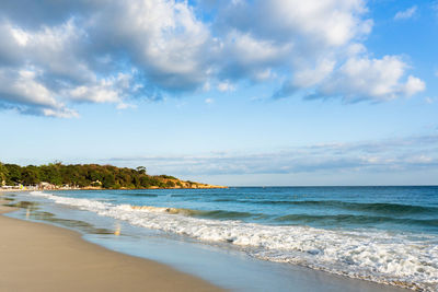 Scenic view of beach against sky