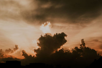 Scenic view of dramatic sky during sunset