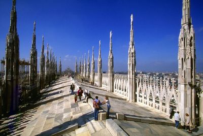 Tourists in front of building