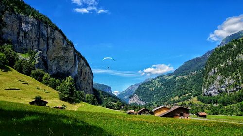 Scenic view of landscape against cloudy sky