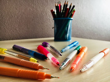 Close-up of colored pencils on table