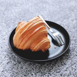 High angle view of bread in plate on table