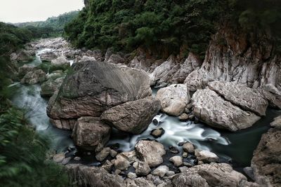 Scenic view of rocks in river