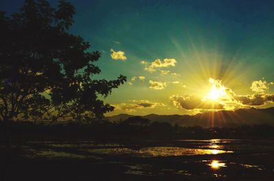 Scenic view of sunset over lake