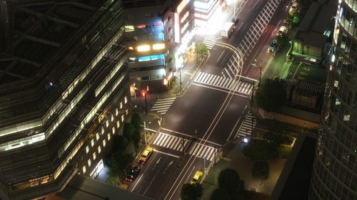 High angle view of illuminated city at night