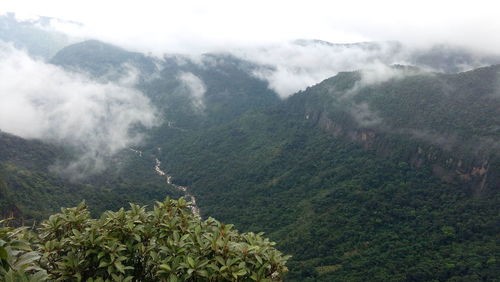 Scenic view of mountains during foggy weather