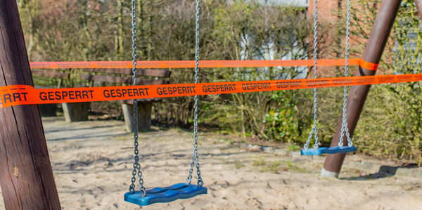 Close-up of swing in playground