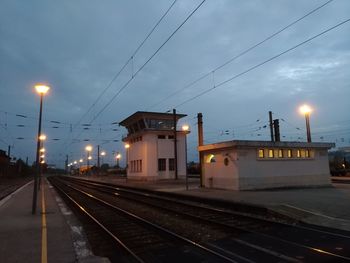 Railroad station platform at dusk