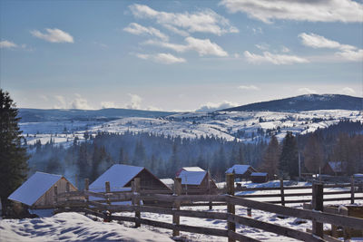 Scenic view of snowcapped mountains against sky