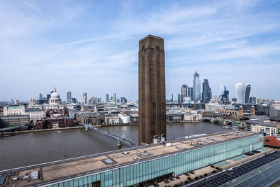 Modern buildings in city against sky