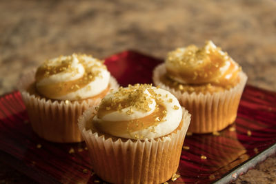 Close-up of cupcakes on table