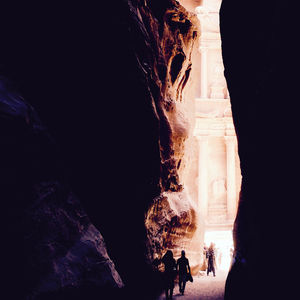 People walking in cave