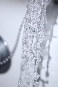 Close-up of icicles on snow