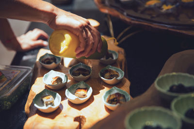 High angle view of person preparing food