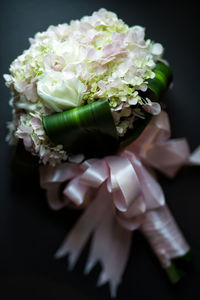 Close-up of flower bouquet against black background