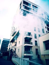 Low angle view of modern building against sky