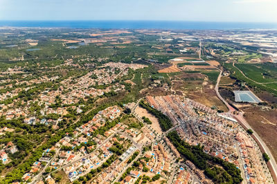 High angle view of buildings against sky in city