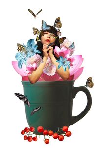 Portrait of young woman with pink flowers against white background