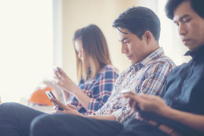 Young man using smart phone