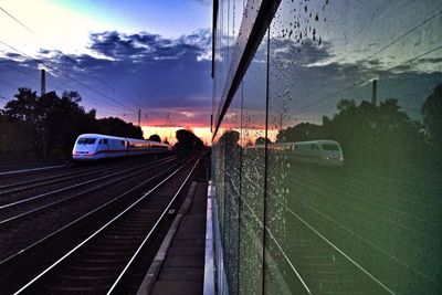 Railroad track seen through train windshield