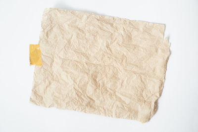 High angle view of paper against white background