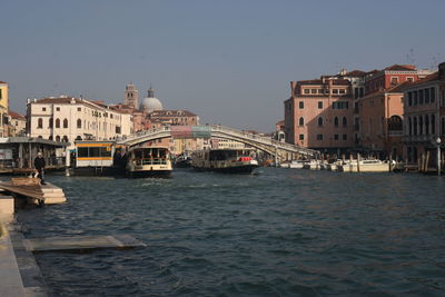 Scenic view of sea and buildings against sky